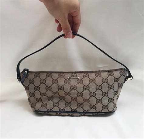 posso trovare una pochette vintage gucci|gucci pouch women.